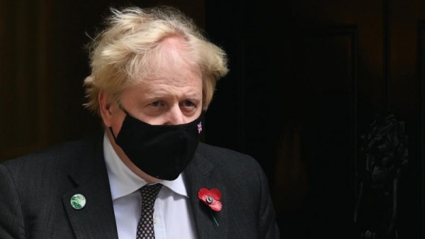 Get jabbed for Christmas, Johnson urges UK as virus surges