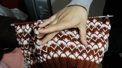 Afghans living in limbo in Albania start knitting to heal their trauma