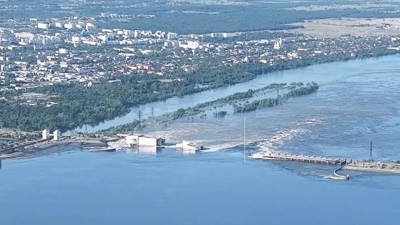 Kakhovka dam in southern Ukraine is blown, unleashing flood of water